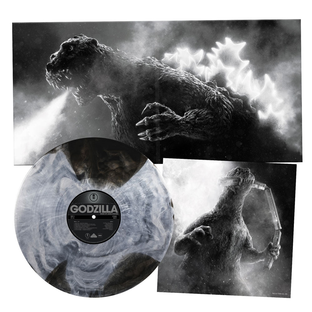 Vinyl record with Godzilla design and text, surrounded by black and white images of Godzilla.