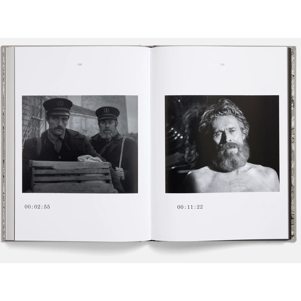 Open book showing black and white photographs of men, with timestamps on each image.