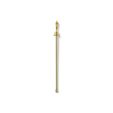 Gold-colored metal Oscar statue drink stirrer with a spherical end on a white background