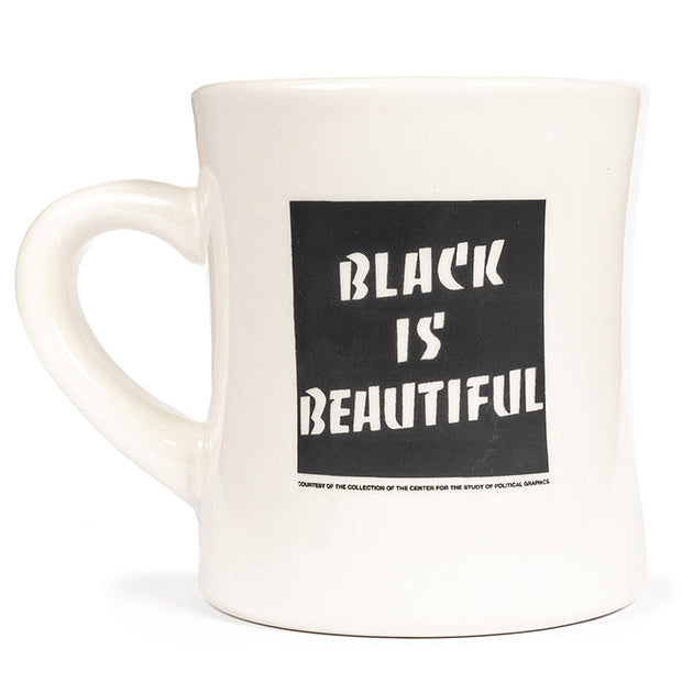White mug with 'Black is Beautiful' text on a white background