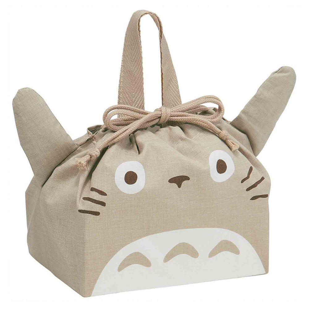 Beige drawstring bag with cartoon face design on a white background image of grey Totoro from Studio Ghibli's My Neighbor Totoro