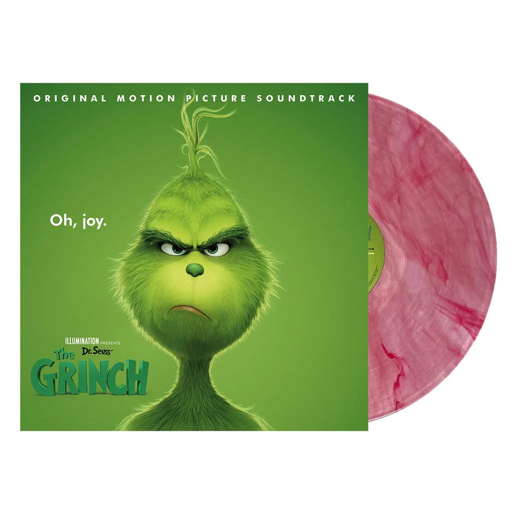 Vinyl record with 'The Grinch' cover featuring a green character and pink disc.