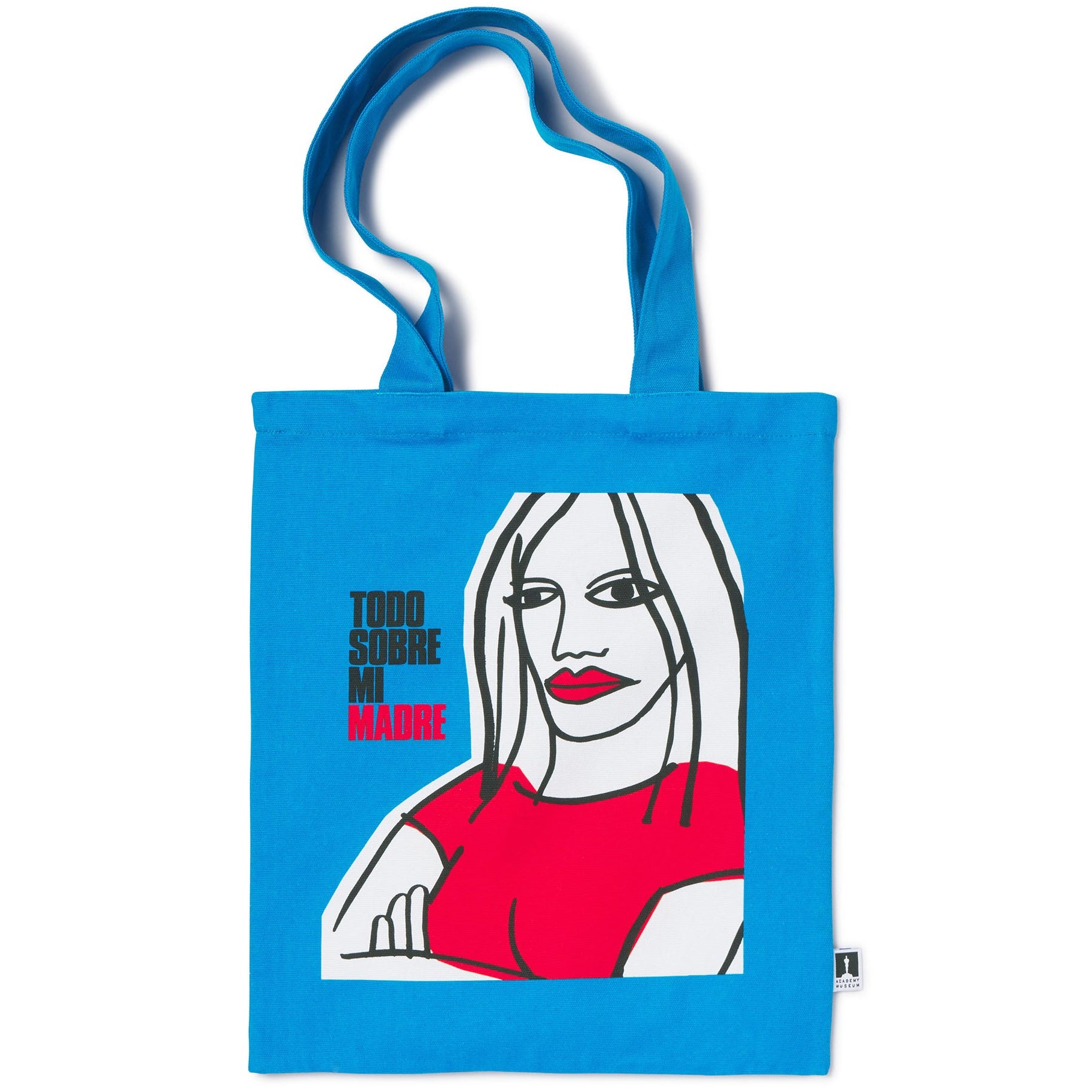 A blue canvas tote bag featuring a graphic print of a female figure in red and white, with text on the side.