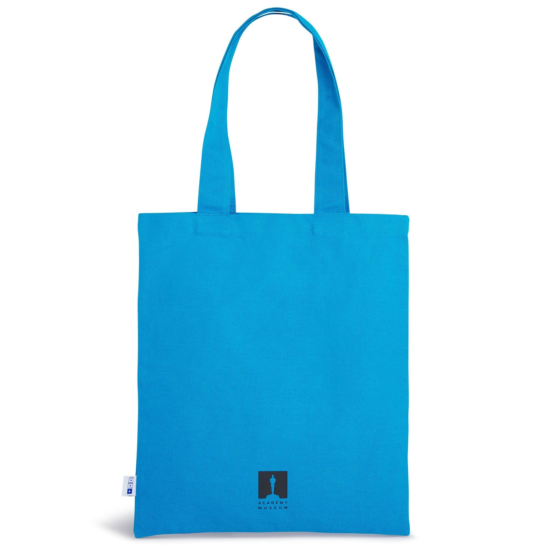 Blue tote bag with a logo on a white background Canvas tote featuring the poster art from the film TODO SOBRE MI MADRE by Pedro Almodóvar. Featuring the Academy Museum logo and is available exclusively at the Academy Museum Store
