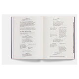 Open book with text on a white background screenplay lines