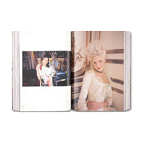 Open book showing two pages with images of a woman in elegant attire. Kirsten Dunst dressed as Marie Antoinette in Sofia Coppola's movie