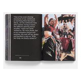 Open book with text and a photo of a woman dancing in a crowd.