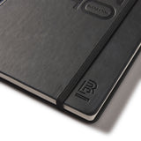 Black notebook with a brand logo BLACKWING on a white background