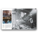 Book page with black and white photograph of a person working on a large mechanical structure, with smaller images and text on the left.