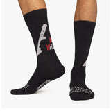 Black socks with graphic design and text on a white background