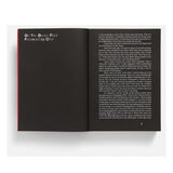 Open book with text on a white background
