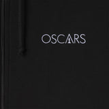 closeup of Black jacket with 'OSCARs' logo embroidered on it
