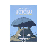 Planner with Totoro holding an umbrella on a blue background