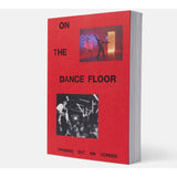 Book titled 'On the Dance Floor' with red cover and black text
