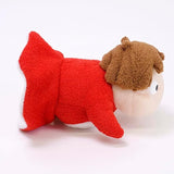 Small plush toy with a red body and brown head on a white background
