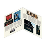Open book or magazine with images and text on a white background