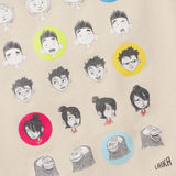Pattern of cartoon character heads with different expressions and colors on a beige background, featuring the Laika logo.