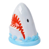 Jaws the great whiteshark ceramic salt and pepper shaker with red mouth and blue waves on a white background