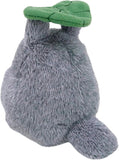 Plush toy resembling a platypus with a green bill on a white background