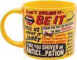Yellow mug with text and graphics on a white background