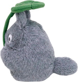 Plush toy resembling a gray creature with a green leaf on its head against a white background. Embrace the cuteness of Totoro with this 4-inch bean bag plush! Perfectly soft and officially licensed, it's an ideal collectible for Studio Ghibli enthusiasts.