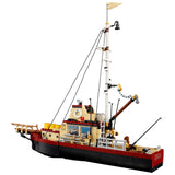 Model ship made of interlocking bricks on a white background Jaws (1975) 50th Anniversary Lego Set