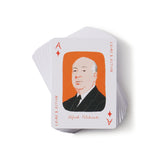 Playing cards with Alfred Hitchcock design on a white background