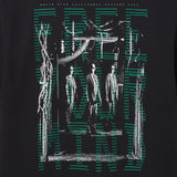 Black t-shirt with graphic design of three figures and green lines on a dark background image of Agent Smith from the movie The Matrix