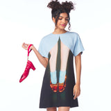 Woman wearing a dress with a graphic of red shoes and holding a pink shoe on a white background