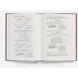 Open book with screenplay lines on a white background