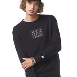 Person wearing a black sweatshirt with text on a white background Academy Museum Los Angeles Logo adult sweatshirt for men and women