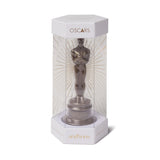 white logo box with chocolate oscar inside