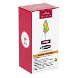 Clueless 2023 Hallmark Keepsake Ornament packaging with a woman in a green coat on a white background