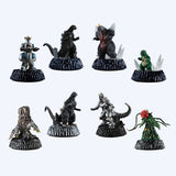 Set of eight Godzilla figurines on black bases against a white background. New arrival Godzilla blind box figures Academy Museum