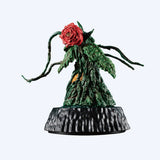 Figurine of a plant-like creature with a red flower on a white background New arrival Godzilla blind box figures Academy Museum