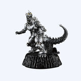 Metallic Godzilla figurine on a white background. New arrival Godzilla blind box figures Academy Museum