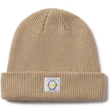 Beige knit beanie with a label on a white background