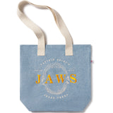 Blue tote bag with 'JAWS' text on a white background