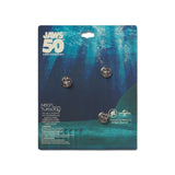 Jaws 50th Anniversary pin backing on a branded packaging with Universal Studios logo.