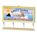 Decorative ornament resembling a billboard with 'Amity Island Welcomes You' text and beach scene.