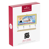 Hallmark Keepsake Christmas ornament packaging with 'Amity Island' billboard design.