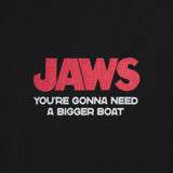 Black t-shirt with red and white 'JAWS' text on a black background