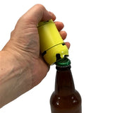 Jaws logo metal bottle opener shaped like a barrel image of a bottle and hand showing how to use it 