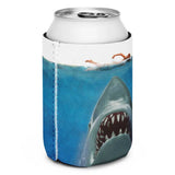 Can cooler with shark design and person in water on a white background. Celebrate 50 years of Jaws with our stylish can cooler! Keep your drinks chilled with bold artwork, perfect for beach days and movie marathons.