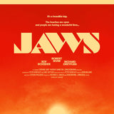 Vintage 'Jaws' movie poster with bold text on a red background. Screen print limited poster print by artist Matt Ryan Tobin and CODA Jaws 50th Anniversary Limited Edition Poster Academy Museum Screen Printed Numbered Limited Edition Poster Curated by CODA