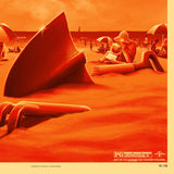Surreal beach scene with large fork and knife, people under umbrellas, and a sand sculpture.