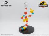 Colorful toy figure on a black base with Paragon FX Group and Jurassic Park logos. Jurassic Park Mr. DNA Authentic Movie Prop Replica at The Academy Museum Store Los Angeles