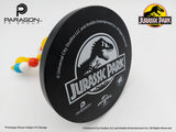 Jurassic Park branded product with Paragon PX Group logo on a white background. Jurassic Park Mr. DNA Authentic Movie Prop Replica at The Academy Museum Store Los Angeles
