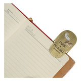 Notebook with a bookmark labeled 'Pride & Prejudice' by Jane Austen on a white background