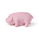 Pink plush pig toy on a white background